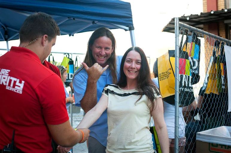 <!--ybor4year-->

I caught Chad and Suzie Cardoza, Mr. and Mrs. Kickstart My Art, being wrist-banded at the entrance of the party. If you haven't checked out Kickstart My Art, give it a look. They're great people.



