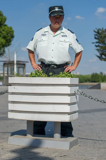 <!-- damnamchina2013 -->

There are security guards everywhere on the streets of Shanghai, but they don't really do much. If they do try to kick you out, its just a weird, awkward confrontation. The end result is them just uttering words at you in Chinese as you skate around them. 