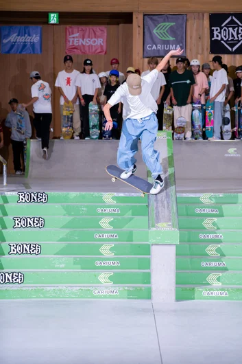 The winning trick from the bunch from Raimu Sasaki: switch 180 crook nollie flip. The most insane trick of the contest. I've got the IG clip at the top of the article. Next photo shows the flick out

<!--damnamjapan2022besttrick-->