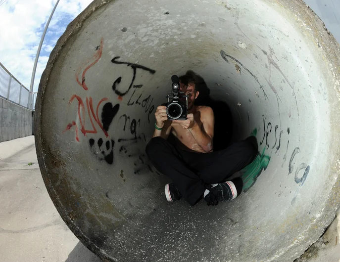 <!-- FranksForNothingLakeLand -->
How does Frank get the best angles? Because he's more dedicated than you - or just crazier. Anyway, he's not afraid to crawl into tunnels that may have giant arachnids, anacondas and other creepy-crawlers in them.