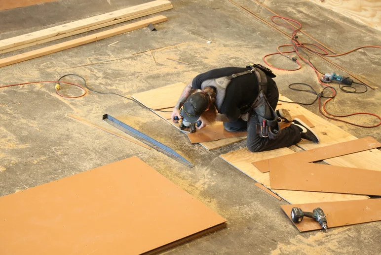 <!--coursephotos16-part2-->

Course building 101: Gene is pre-drilling all the holes where the screws will go.