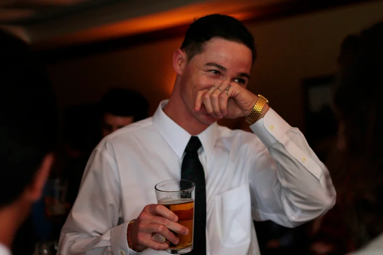 <!--lukeswedding-->

Yonis Molina enjoying the free beer at the reception.