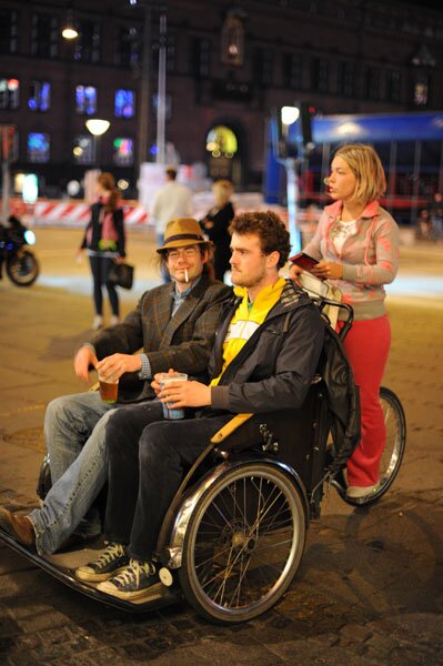 Random dudes on a rickshaw ride.  Impossible cool