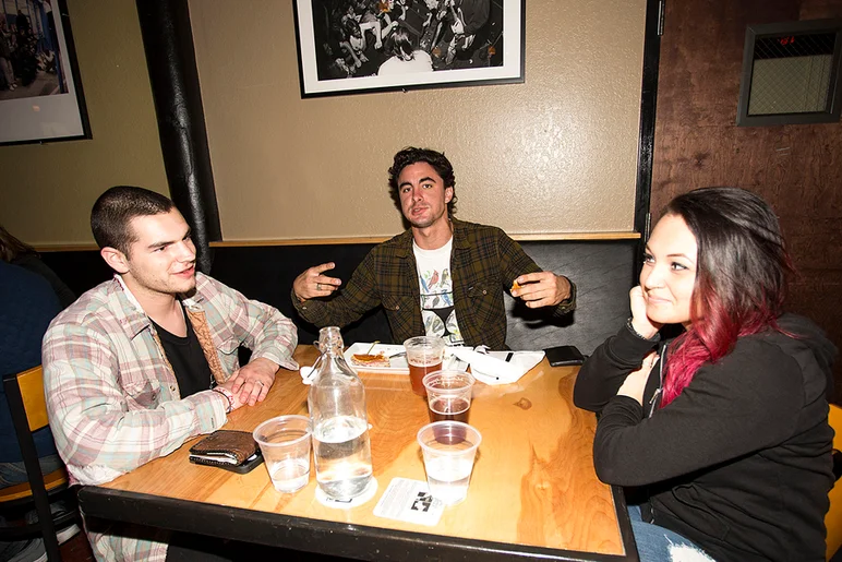 <!--pro16sunnight-->

Anthony Schultz enjoying a meal at The Bricks before the night got started.