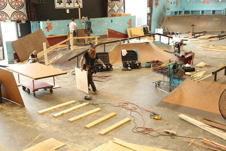 <!--coursephotos16-part2-->
Here's an overview of how the Best Trick pyramid is coming along. Looks like a center rail is being installed. The dude with the massive red beard is Gene and he kills it.