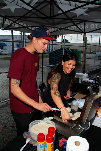 <!--vans50th-->

Outside we had waffle cup waffles for everyone. Eric and our Vans rep whipping them out.