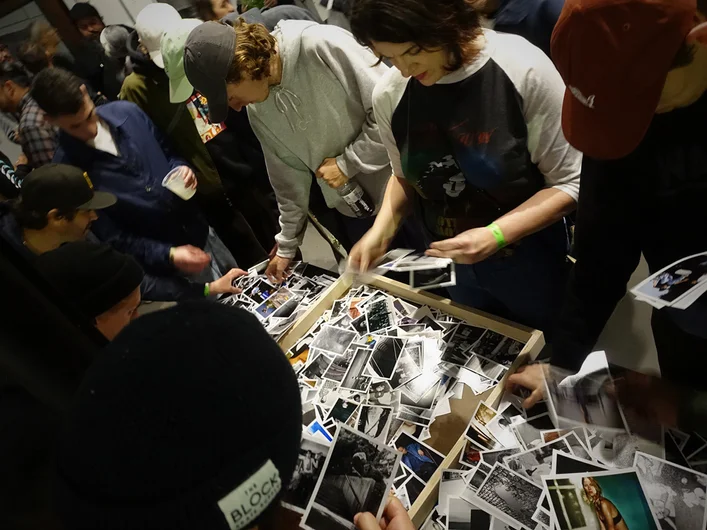 <!--pro20deckaid-->

Meanwhile, at The Bricks, legendary 90's photographer Pete Thompson was holding a show of his own. He brought thousands of these postcard-sized prints to sell, some of them older than the people buying them!