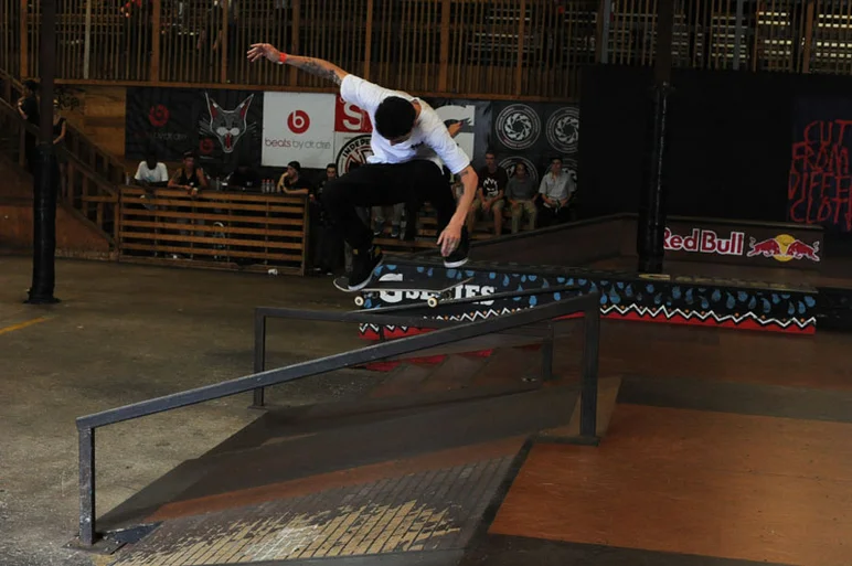 Yonis Molina - fakie flip over the rail.<!-- Back to School Bash 2012 Presented by Altamont -->