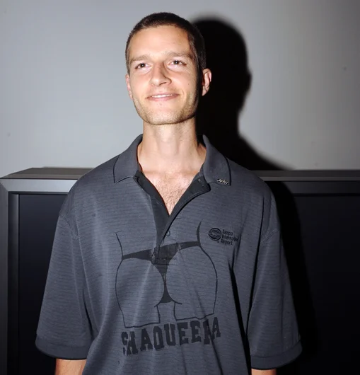 <!-- shaqueefapremiere13 -->

Jimmy Lannon wearing a TIA (Tampa International Airport) X Shaqueefa OG collaboration T-shirt.