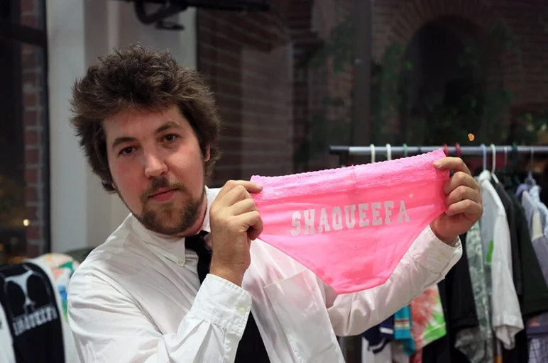 <!-- shaqueefapremiere13 -->

The Bodfather himself, aka Body Chrons, aka The Body. Scotty Conley, CEO and founder of Shaqueefa, holds a pair of panties that would look good on your girlfriend, so hopefully you bought some for her while you were at the premiere.