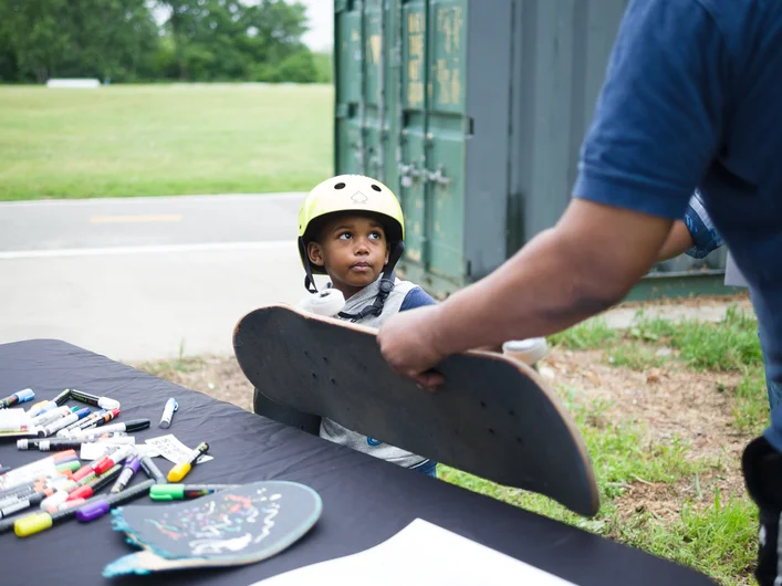 <!--b4bdrivenyc-->

Volunteers helped the kids decorate their boards so they knew it was theirs to keep.