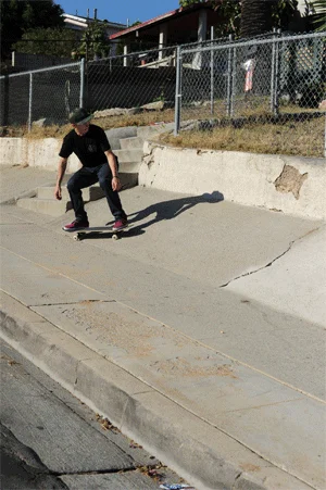 Downhill spots are scary unless you're damn good at skateboarding.  Jereme's switch crook wasn't a problem.<!-- One Day in East LA -->