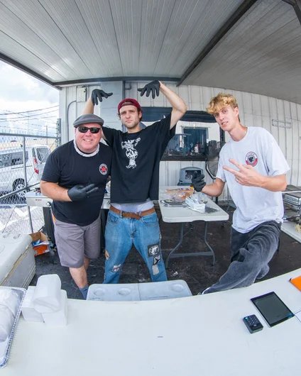 Woody, Caleb, and Liam were holding it down on the grill to make sure we the people were fed - the people were definitely fed!

<!--harvestjam2022-->