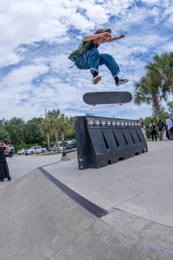 <!--gsd21-->
Speaking of flipping in, Mikey shuts down the cash for tricks with a Kickflip Back Lip. Now it's time to get ready for the long ollie contest.