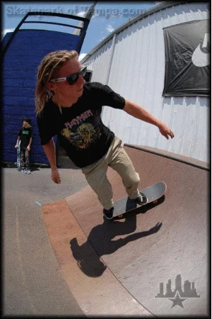 Back to School Jam 2007<br>I like Levi's surf style on the wooden wave outside.  That's a sugar cane at my request