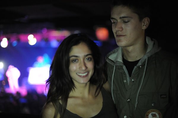 You can find Alex in the Shop behind the counter