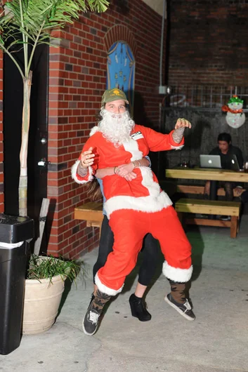 You gotta be strong to be picking up drunk Santa and all that booze he's soaked up.  Who dat?<!-- SPoT Employee Christmas Party at The Bricks 2012 -->