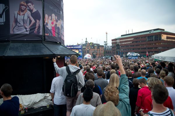 Down the street, the Denmark soccer game is on