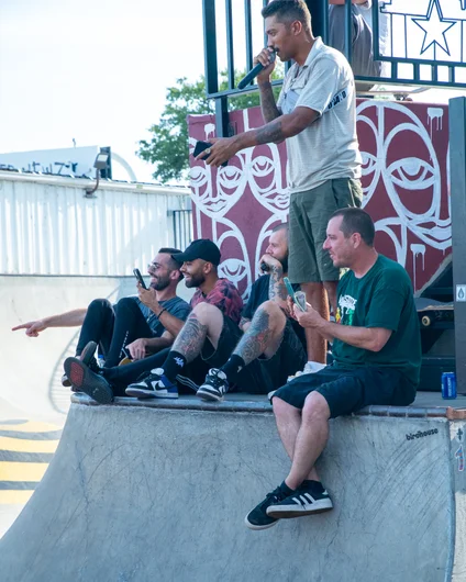 I imagine they are pointing at a board in the pool

<!--goskateday22-->