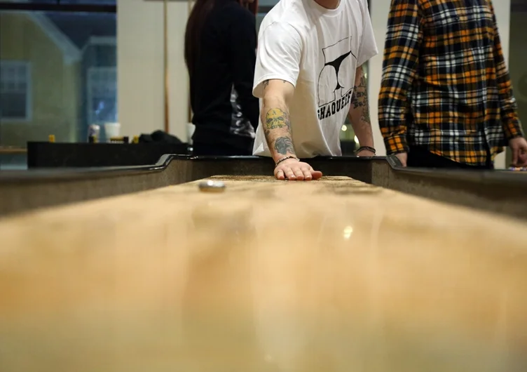 <!-- shaqueefapremiere13 -->

Piro Sierra got down on the shuffleboard table. He's wearing a Shaqueefa tee right now, but I have a feeling he's going to make a wardrobe change before the end of the night.