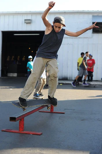 Ronald Mola is going to frontside 180 out of  his feeble grind.<!-- Valentine's Day Massacre 2013 Presented by Converse -->