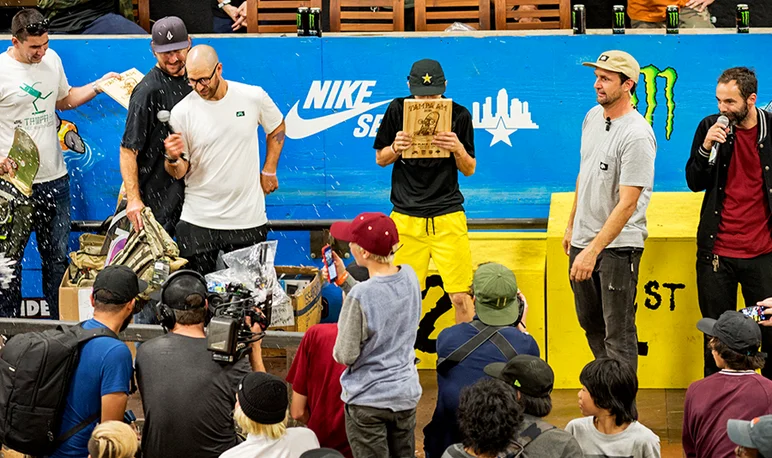 <!--am16sun-->

A couple of Jereme Knibbs' homies attempted to prematurely blast the champagne. Good idea in theory but short lived.  Jereme uses his 6th place trophy as a shield 