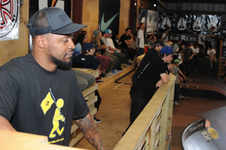 Mike Goodwine is guardian of the good spot on the party deck.<!-- Tampa Am 2012 Photos -->