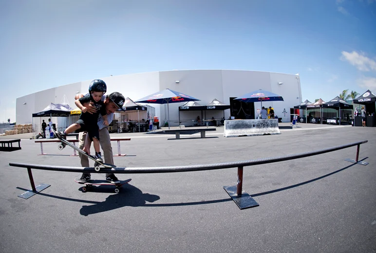 <!--cm153-->

Chad Shetler takes his son for a simulated Nosegrind.