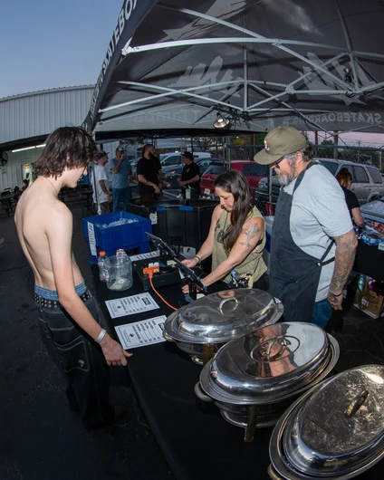 Zach Gross came through with the burgers and dogs to feed the hungry skaters and crowd.
<!--ombj2022-->