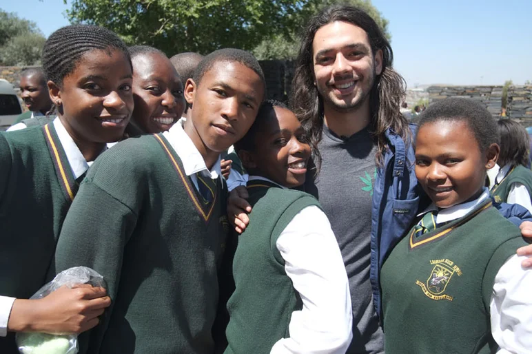 These kids were blown away by Porpe's jeans, beaming hard and taking cell phone photos of them.  They were the Omar X Levix Nike SB's.  <!-- South Africa: Johannesburg for a Day and on to Kimberley -->