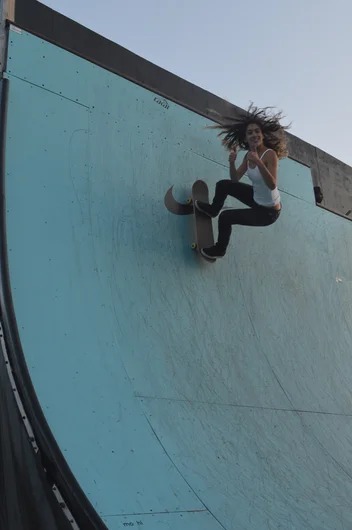 FSEC Alex Biblioni's hair is fully flared.<!-- Andrew Reynolds at SPoT for the Lakeland Skatepark Grand Opening -->