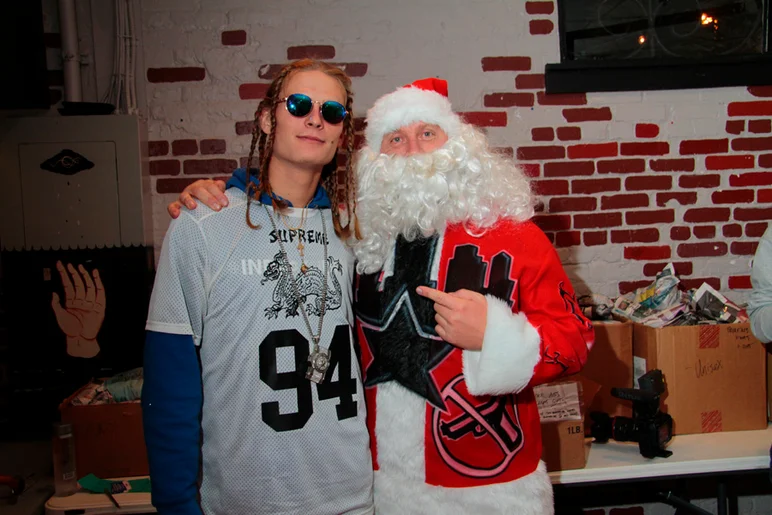 <!--brokexmas15-->

The sun is down and its time to celebrate our 14th annual Broke Ass Christmas Party. Eric McKenney and Santa getting things ready.