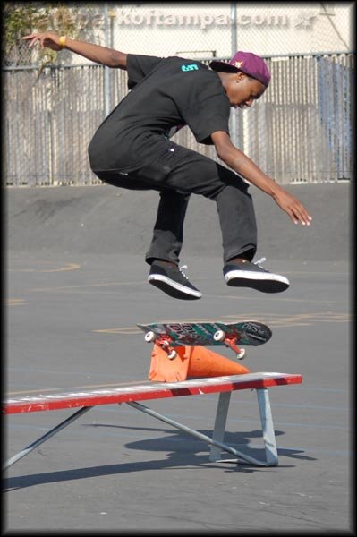 Ricky Webb - kickflip over the bench