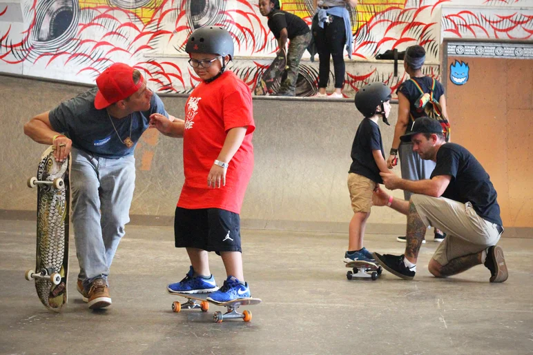 <!--askate18-->

Inside the Pro Course, the clinic is underway with skate coaches helping kids with autism find their rhythm on a board. Some of these future rippers caught on pretty fast.