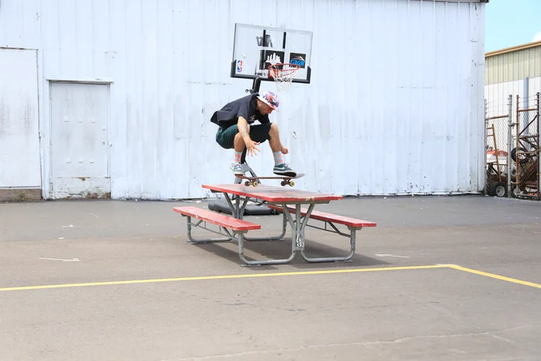 <!--gsd14-->
Tampa local and long time park lurker, Alex Morley had to get an ollie in over the picnic table. 
