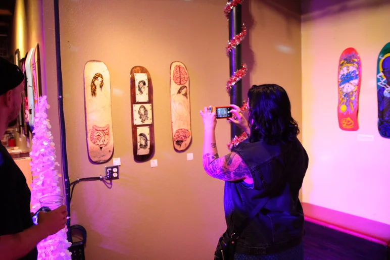 <!--ta14-fn-->
The Deck the Walls art show part 2 went off at The Bricks.  That's Krystal Ralph's contribution.  If you ever need a good tattoo, go see her at Black Fin (upstairs from the Bricks). 