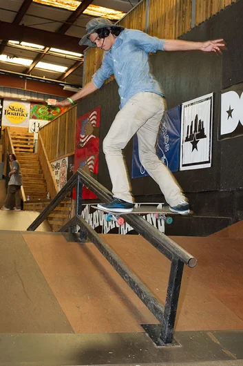 Justin Zaragoza holds his bucket on with a chinstrap through the teeth on back lips like this.<!-- Go Skateboarding Day 2013 With Kayo -->