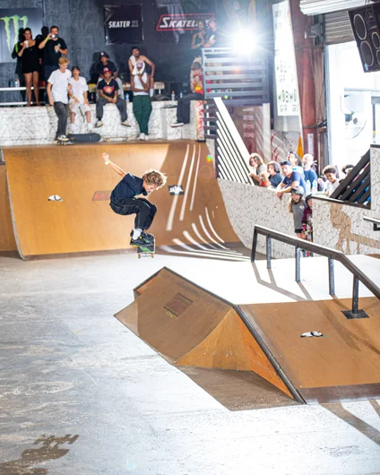 This kid is all over the damn place. Kickflip out the bank to flat

<!--backtoschoolbash2022-->
