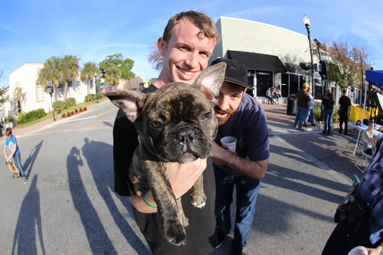 <!--wh15-->

Even your family pet was welcome at the Downtown Throwdown. This little guy was running around and made friends with Frank, so we grabbed him for a photo. 