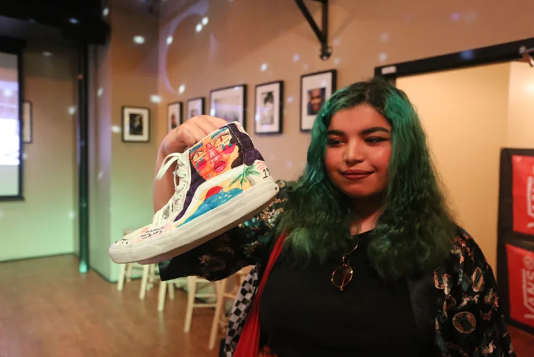 <!--vansbricks-->

This girl showing off her own custom pair of Vans.