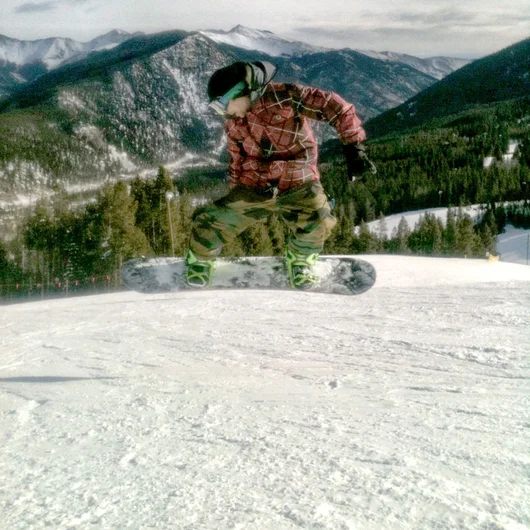 Earlier that day, Clements and I went extreme on the snow sliders.  Picture a two story high jump on the right and a drop off as big as those mountains on the left with me meron grabbing for days over the gap.<!-- Zumiez 100k 2012 -->