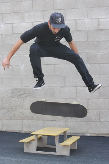 Outside, it's enough of work and now time for play.  We're entertaining ourselves with some optical illusions and the tiny California picnic tables.  HiDefJoe can now say he has kickflipped a picnic table.<!-- A California Work and Play Day -->