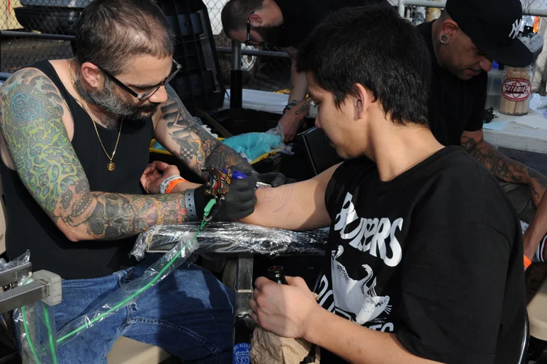 Tony Karr at the Atomic Tattoos tent.<!-- Tampa Am 2012 Photos -->