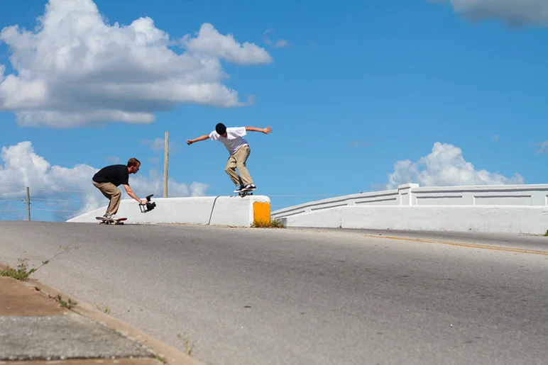 <!--conshaines-->

This spot is insane; it's on an overpass and it was about 5pm. After every try you’d have to wait maybe 5 minutes or more for a break between cars. Brandon BS 50-50 to hill bomb. 