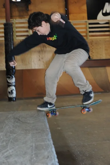 Raymond Irizarry's got a tight looking frontside noseslide.<!-- Black Friday at SPoT Presented by Vans 2012 -->