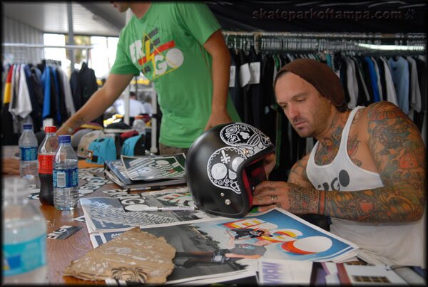 Kris Markovich decorating some helmets