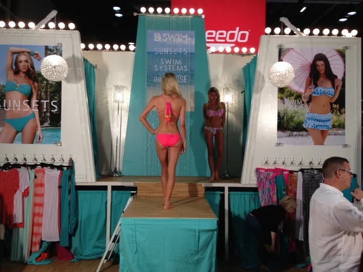 <!-- surfexpo2013 -->

Never hurts to have runway models in bathing suits.