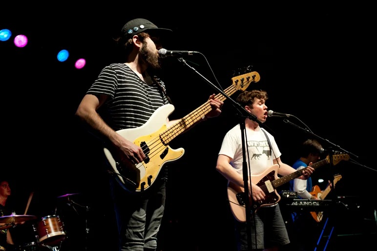 <!--ybor4year-->

Surfer Blood hit the stage well after dark, but illuminated the faces in the crowd with smiles and cheers. Surfer Blood is, from bottom left hand corner to right: Tyler Schwarz, drums; Kevin Williams, bass; John Paul Pitts, lead vocals, guitar; Thomas Fekete, vocals, guitar.









