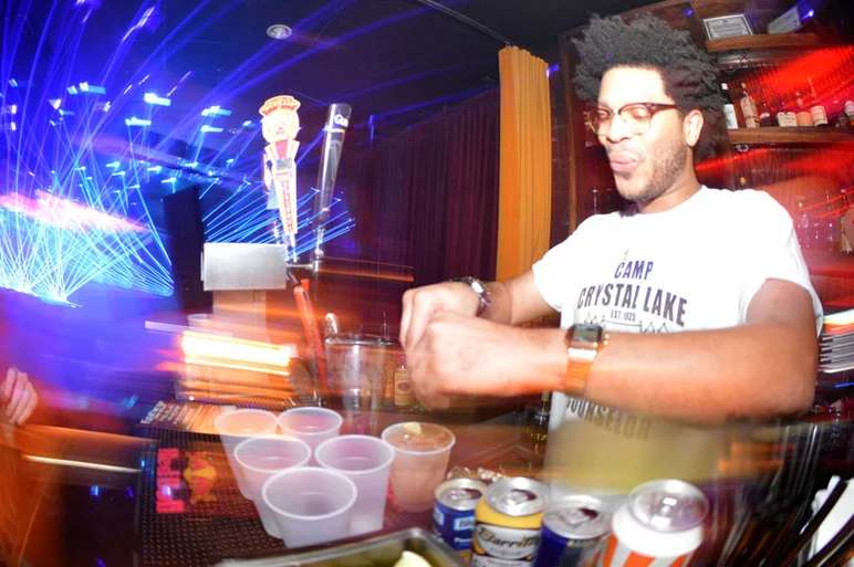 <!--am15frinight-->
That's Louis. He slings drinks at The Bricks and here at Czar, which are coincidentally the two places we were partying at all night.