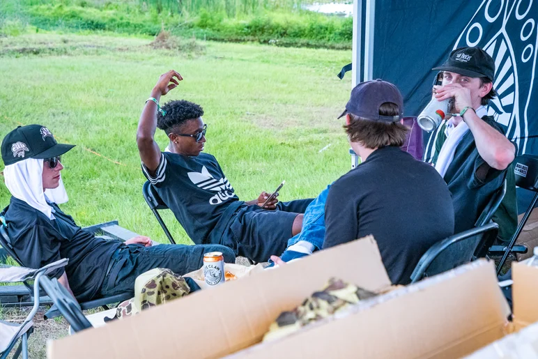 SPoT crew cool down session under the tent before getting back out in that heat.

<!--floridagrovesfest23-->